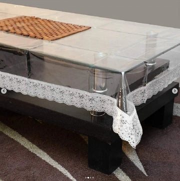 Ryka Transparent PVC table cover to protect your dining table from spills, heat, and scratches. Easy to clean and crystal clear for elegant look.